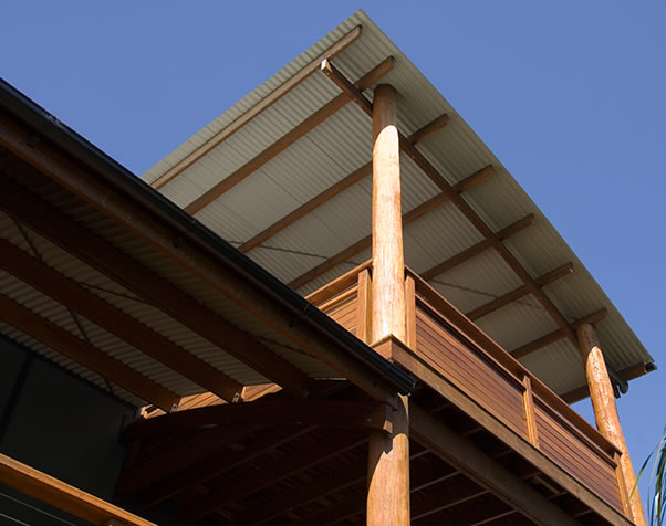 Large image of outside upper deck showing Main pole and the beautiful structural hardwood and decking surrounding it
