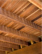 Thumbnail of Underneath a deck showing the hardwood structural joists